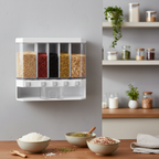 White six-grid wall-mounted cereal dispenser in an organized modern kitchen