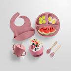 Close-up of the pink WZOC silicone baby feeding set