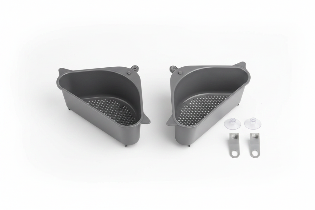 Two triangular dark gray sink strainer baskets with mounting pieces on a white background