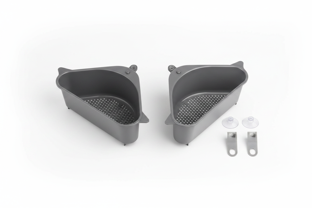 Two triangular dark gray sink strainer baskets with mounting pieces on a white background